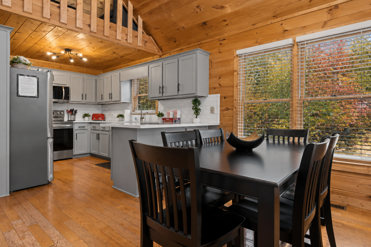 The windows frame your dining table in green, a feast for the senses inside and out.