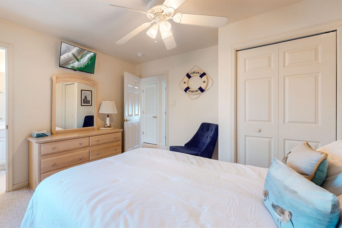 Queen sized bed with huge closet and flat screen TV