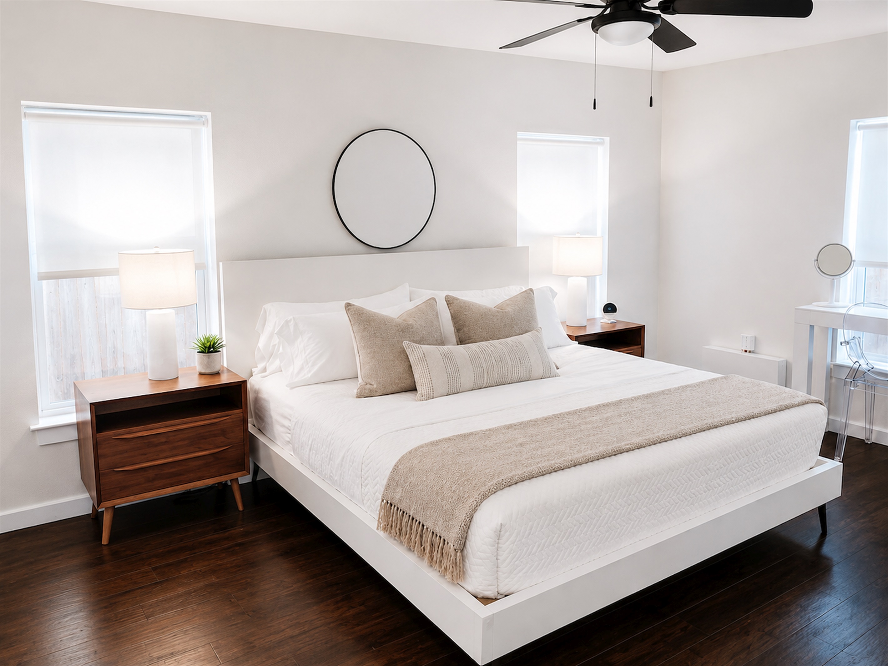 Serene primary bedroom with king bed, luxe linens, blackout shades, and calming modern décor