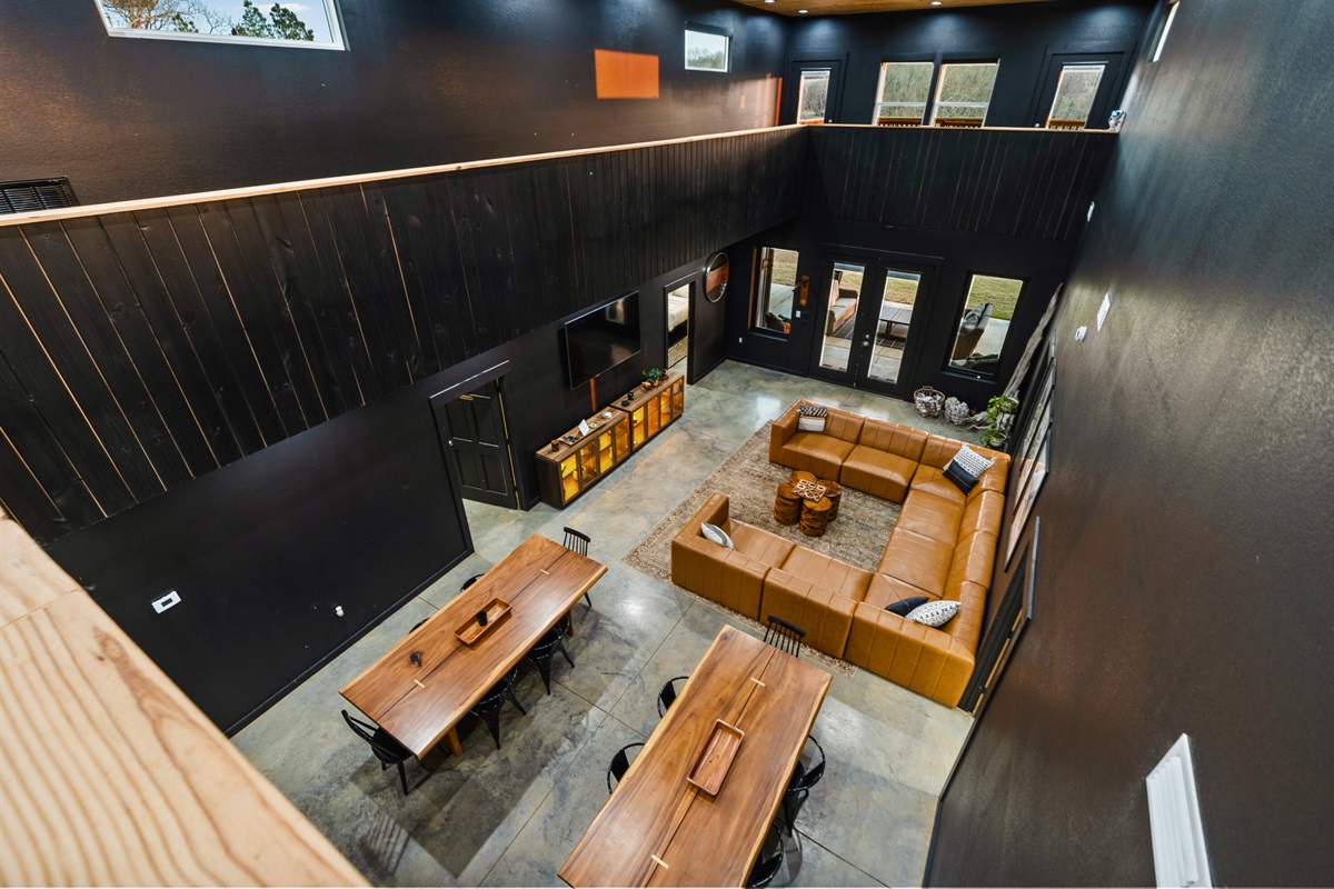From above, you can appreciate the cozy seating areas and open-concept layout that keeps everyone connected.