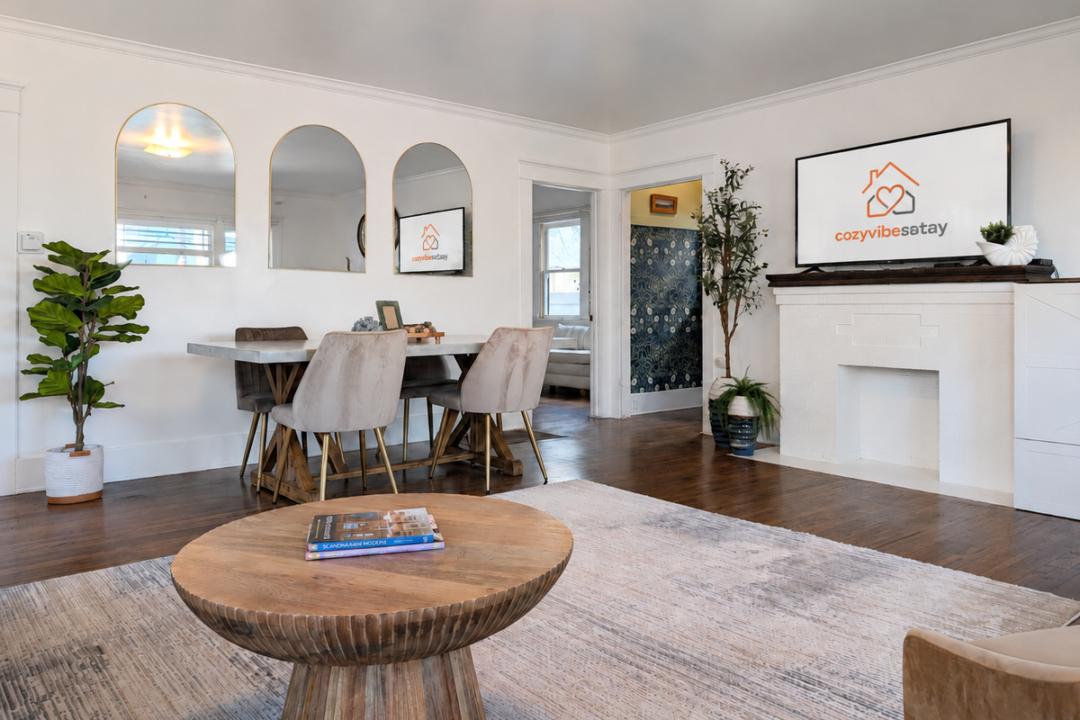Open-concept living and dining area with TV, comfortable seating and spending time together.