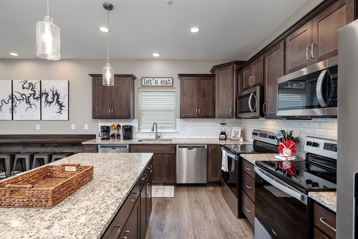 Large kitchen w/2 dishwashers, 2 ovens, 2 microwaves, and refrigerator