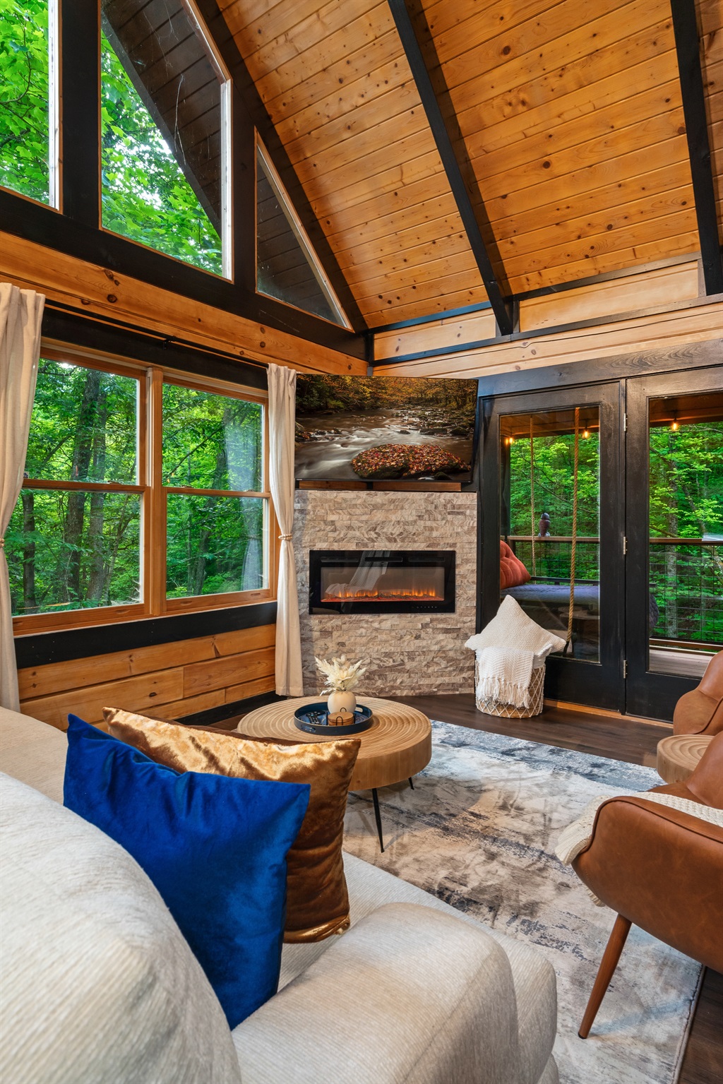 Cozy Fireplace and Large Windows allowing abundant Light