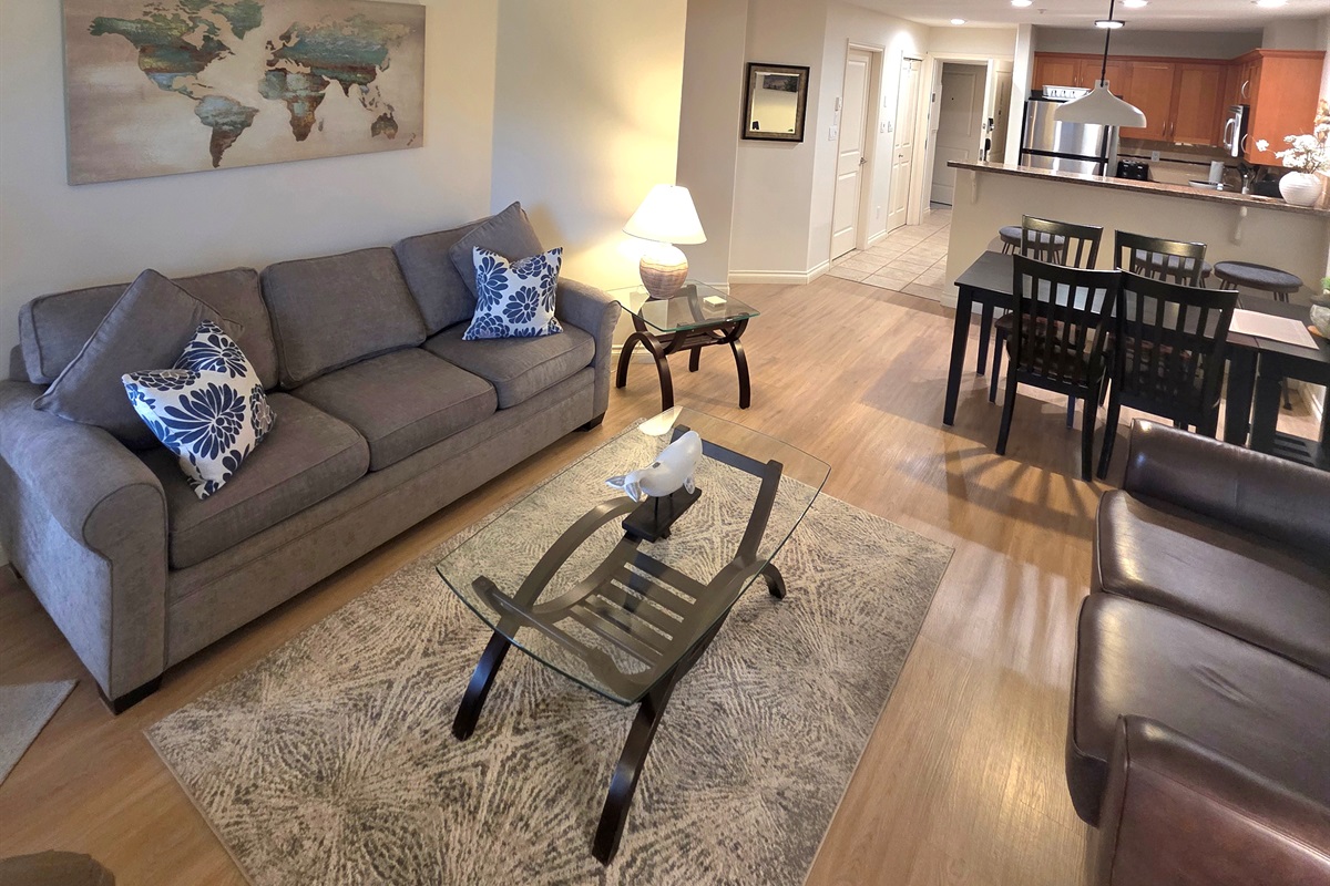 Unit A. The view from executive living room thru kitchen with queen sofa pull out sofa.