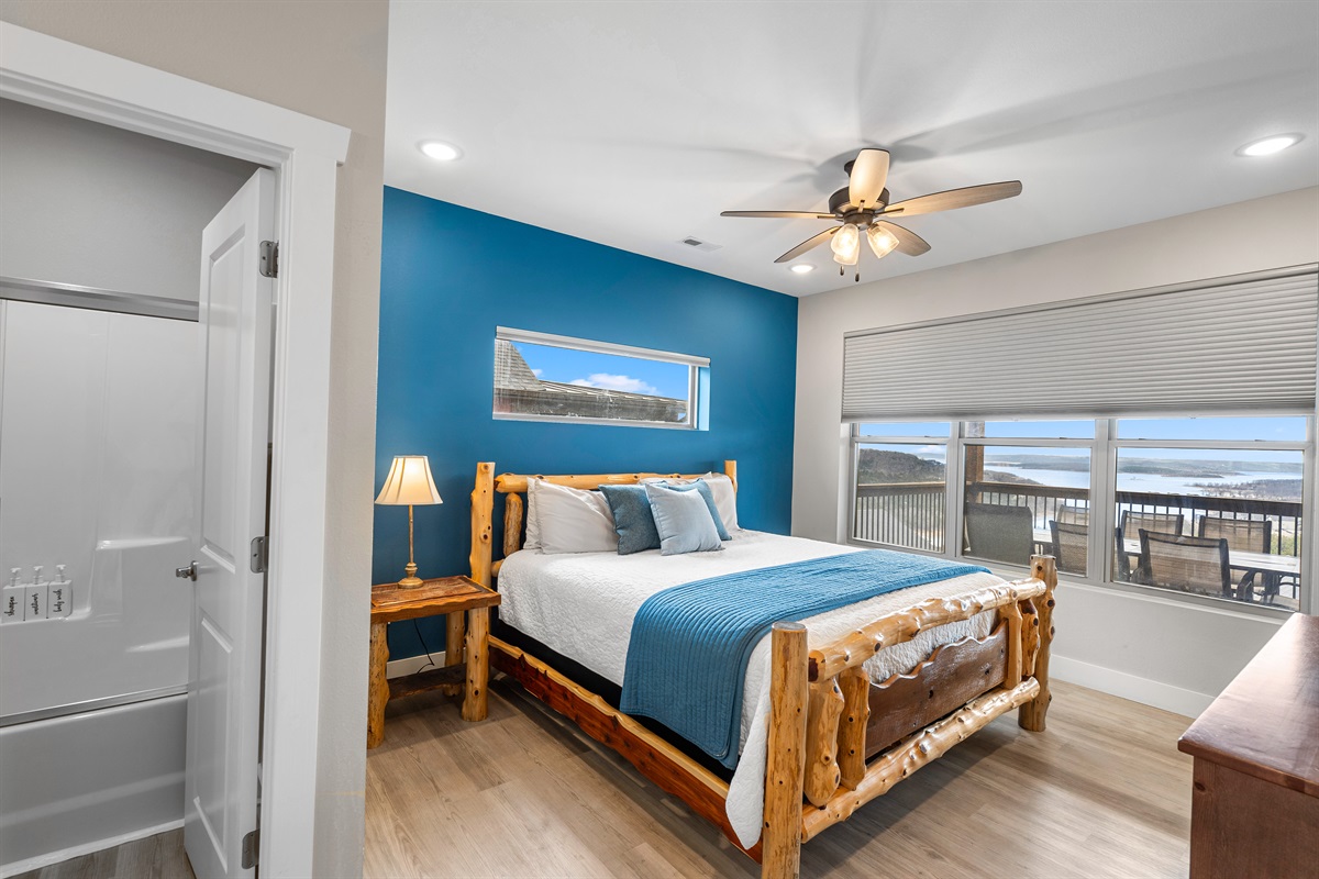 Relax in this upper level king bedroom 7 with en suite shower/tub and lake views 