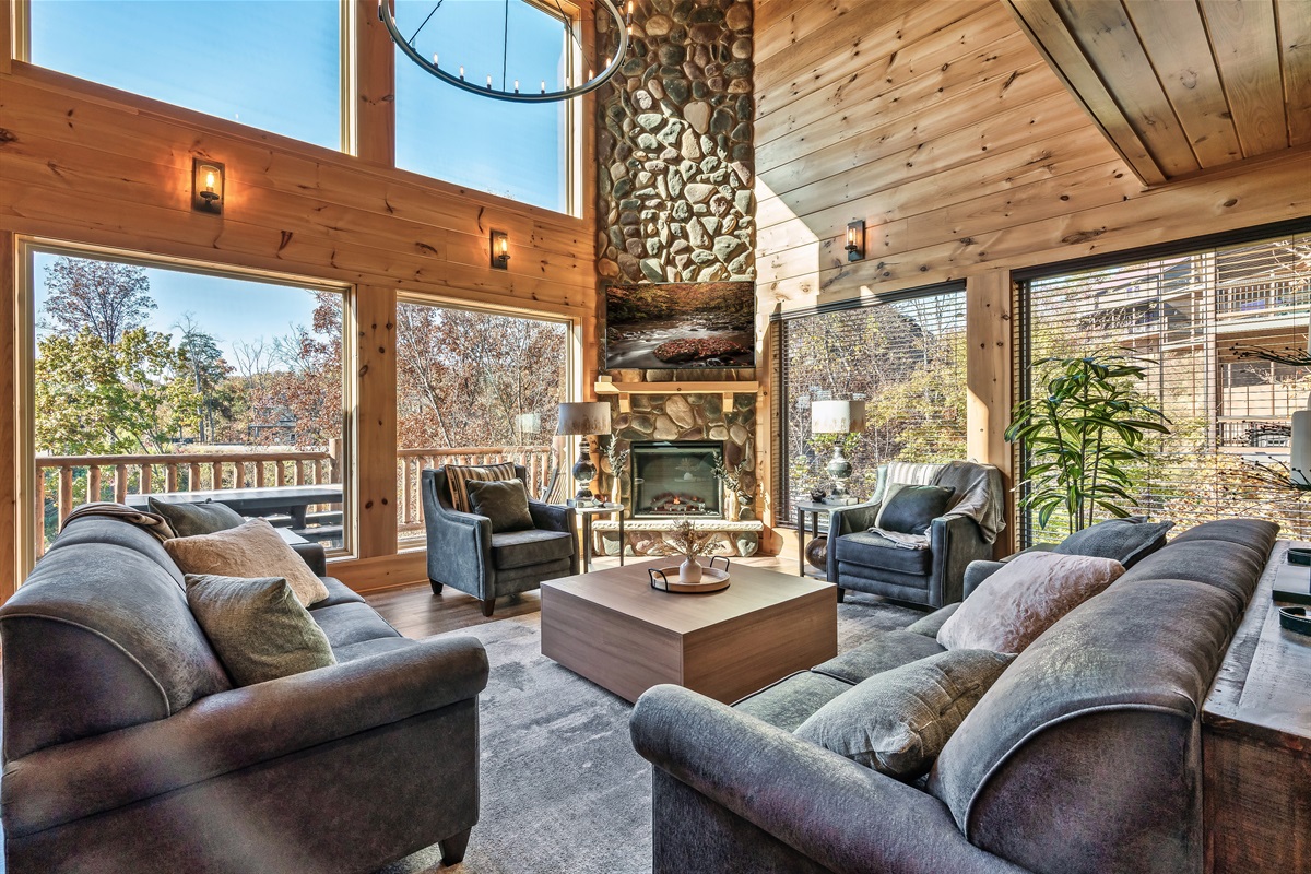 Enjoy hanging out in the wide open living room with expansive windows