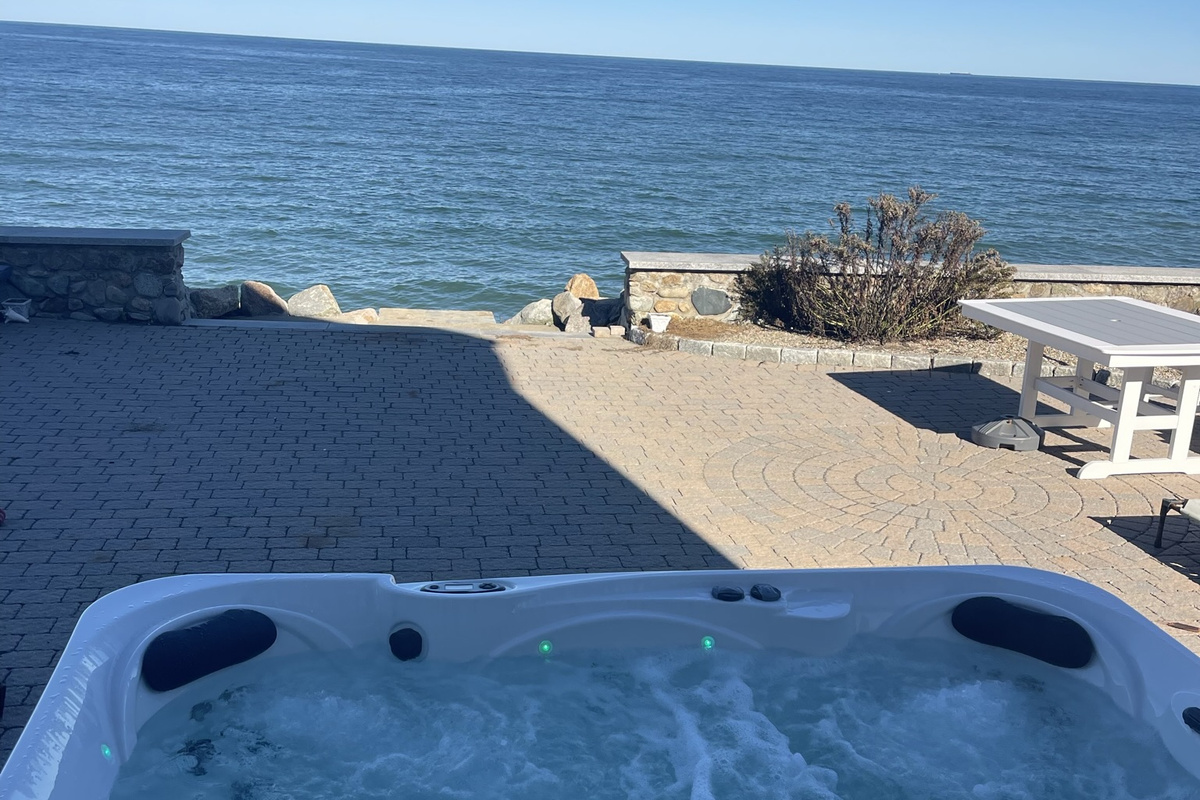 Relax in the hot tub while enjoying stunning views of the Atlantic Ocean.