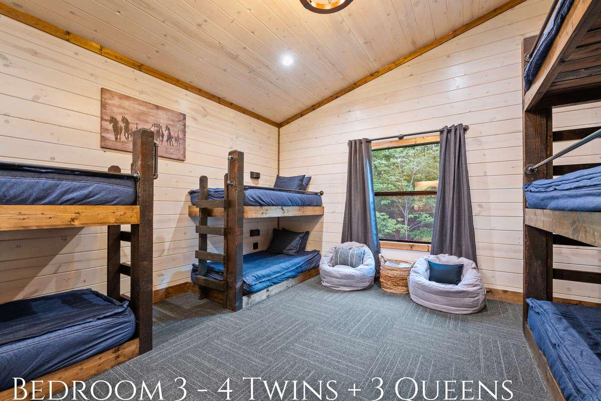 This spacious bunkroom, ideal for family or friends, is a cozy space for sleepovers and shared memories.