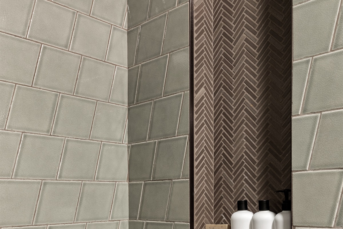 Thoughtfully designed shower niche with custom tilework—stylish, functional details that elevate the space.