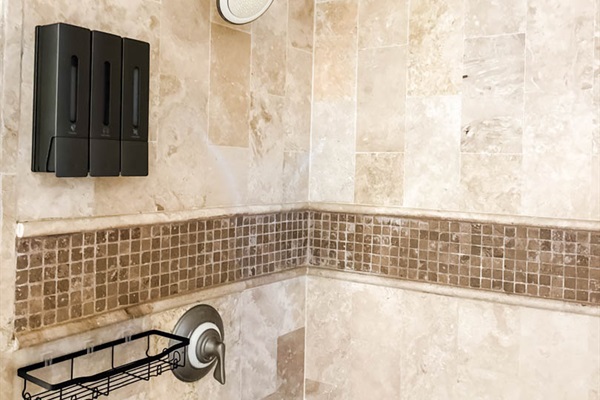Spa-style bathroom with soaking tub and separate walk-in shower.