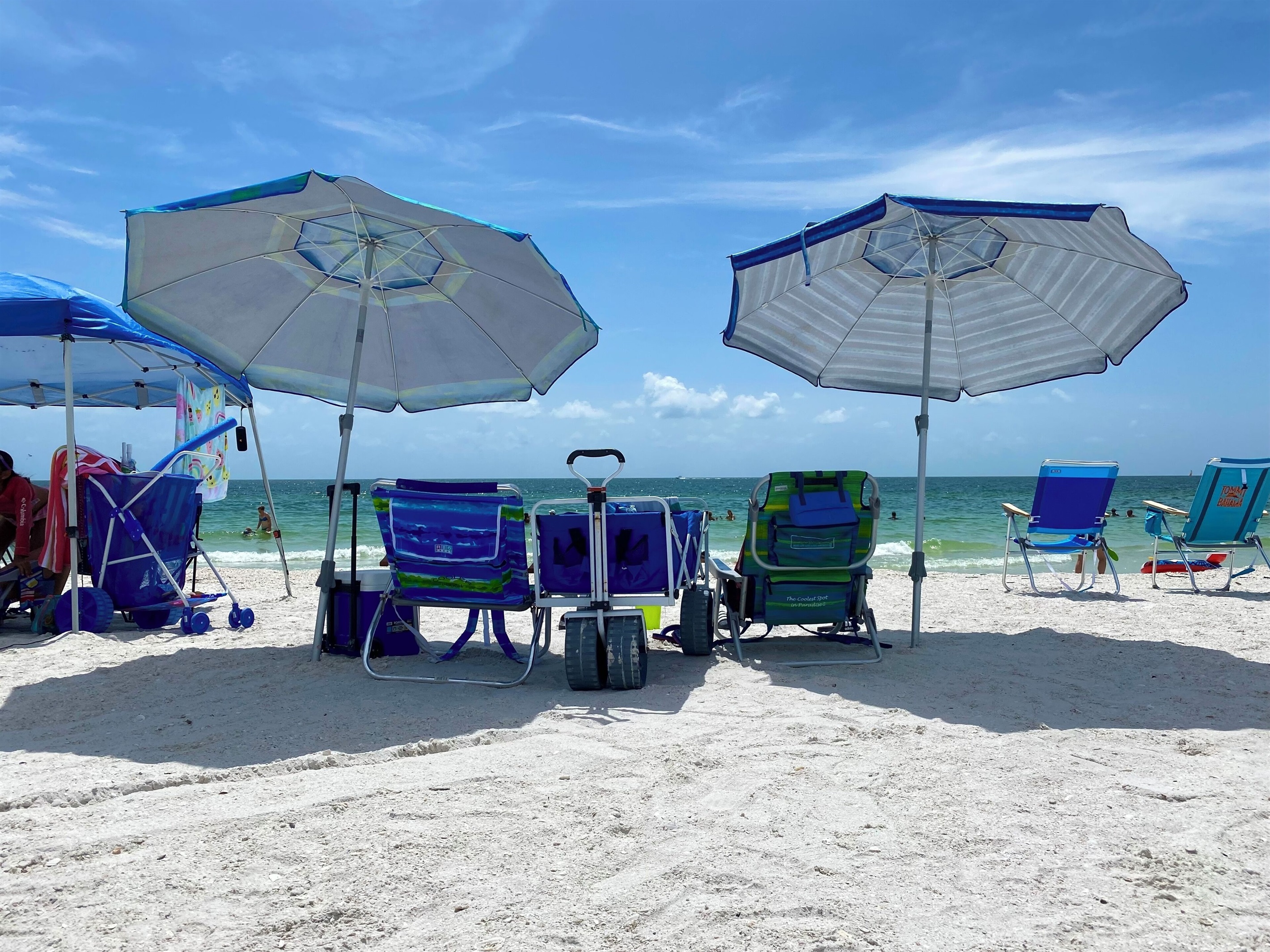 Beach items: 5 beach chairs, umbrella, wagon, beach towels & a cooler