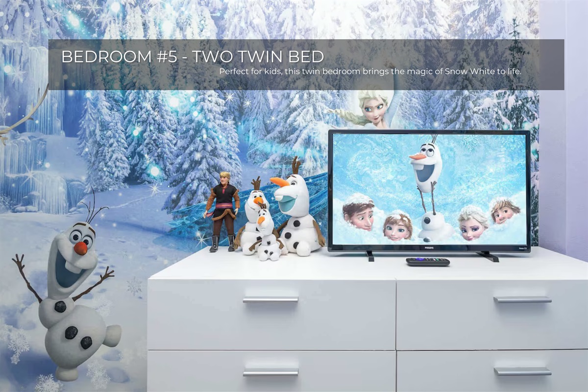A whimsical retreat with twin beds and enchanting Snow White accents.