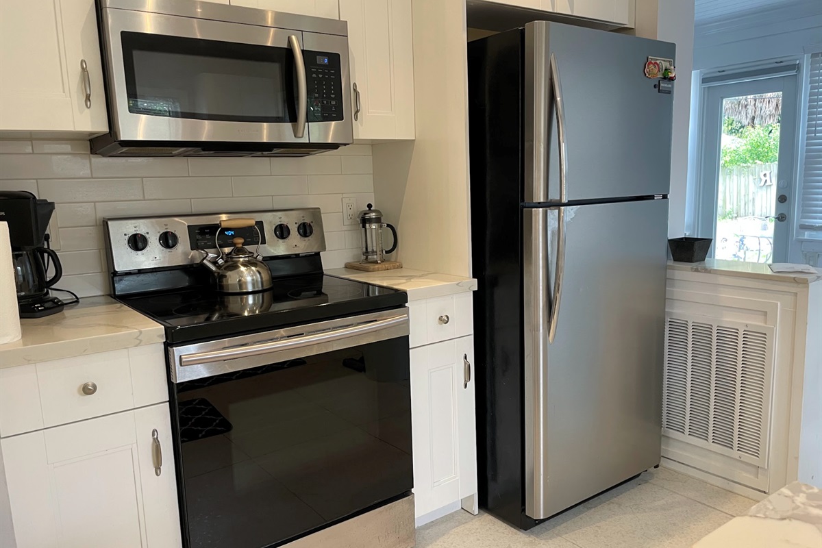 The modern, updated kitchen has all the essentials to make your meals for everyone to enjoy.