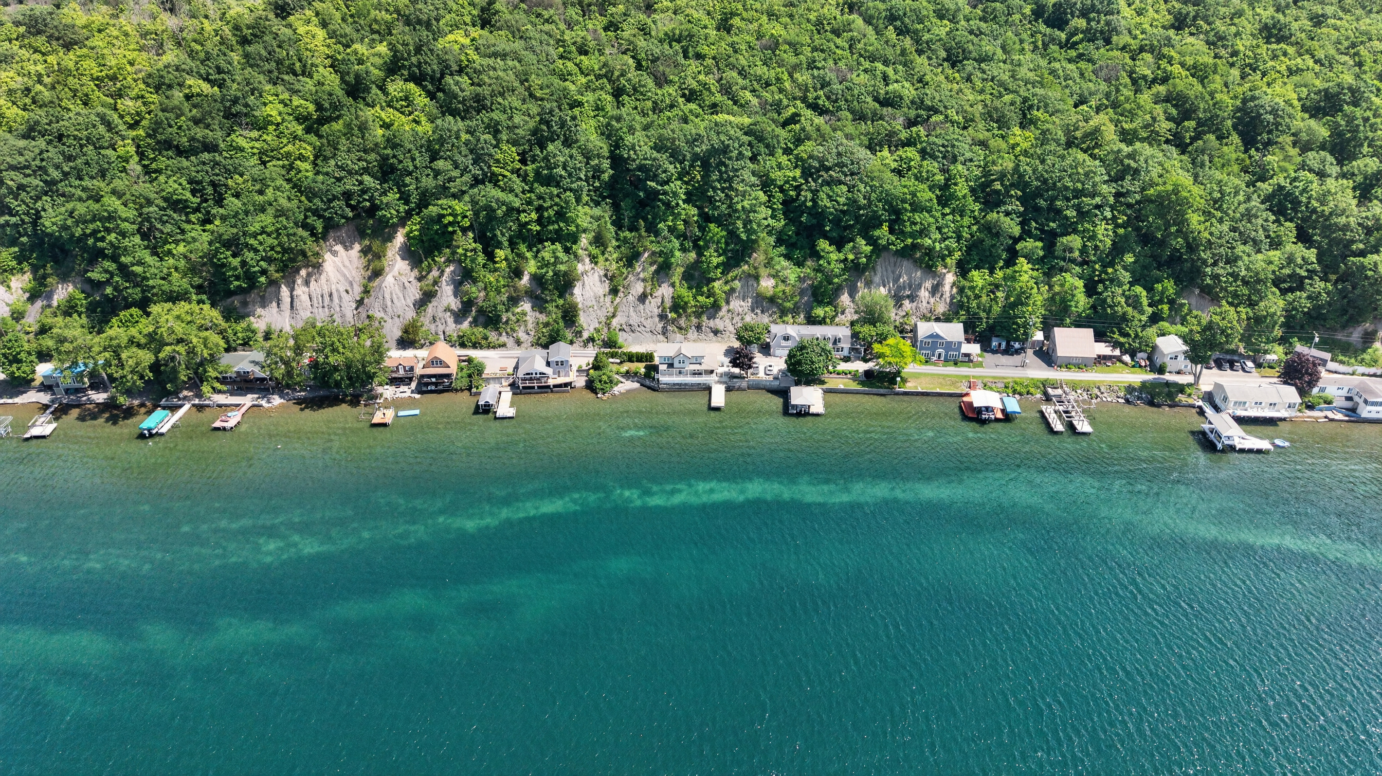 Clear water along the residential shoreline