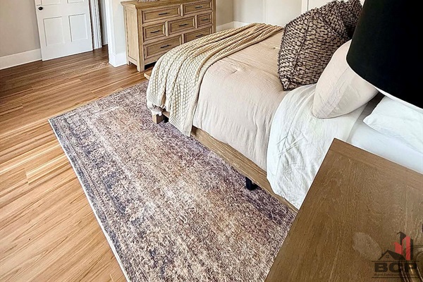Guest bedroom w/ dresser and Smart TV