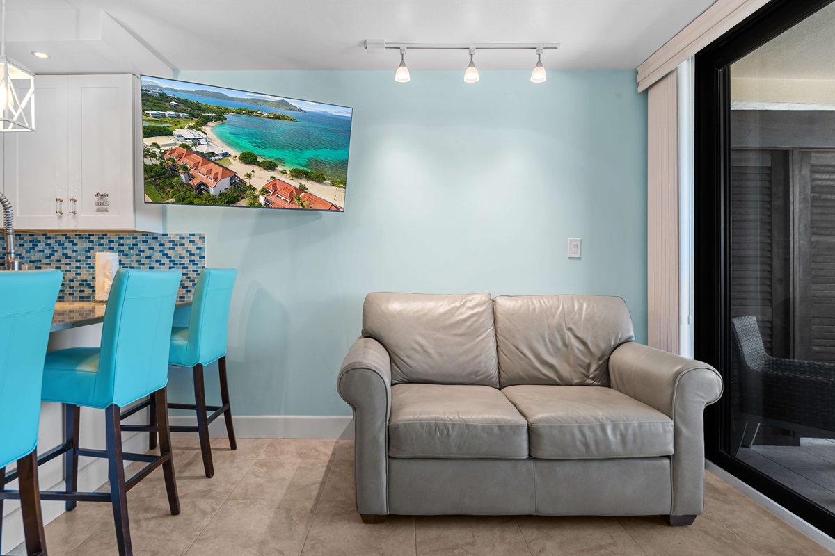 Smart TV in the living room allows you to stream all of your favorites when you're not enjoying the beach!