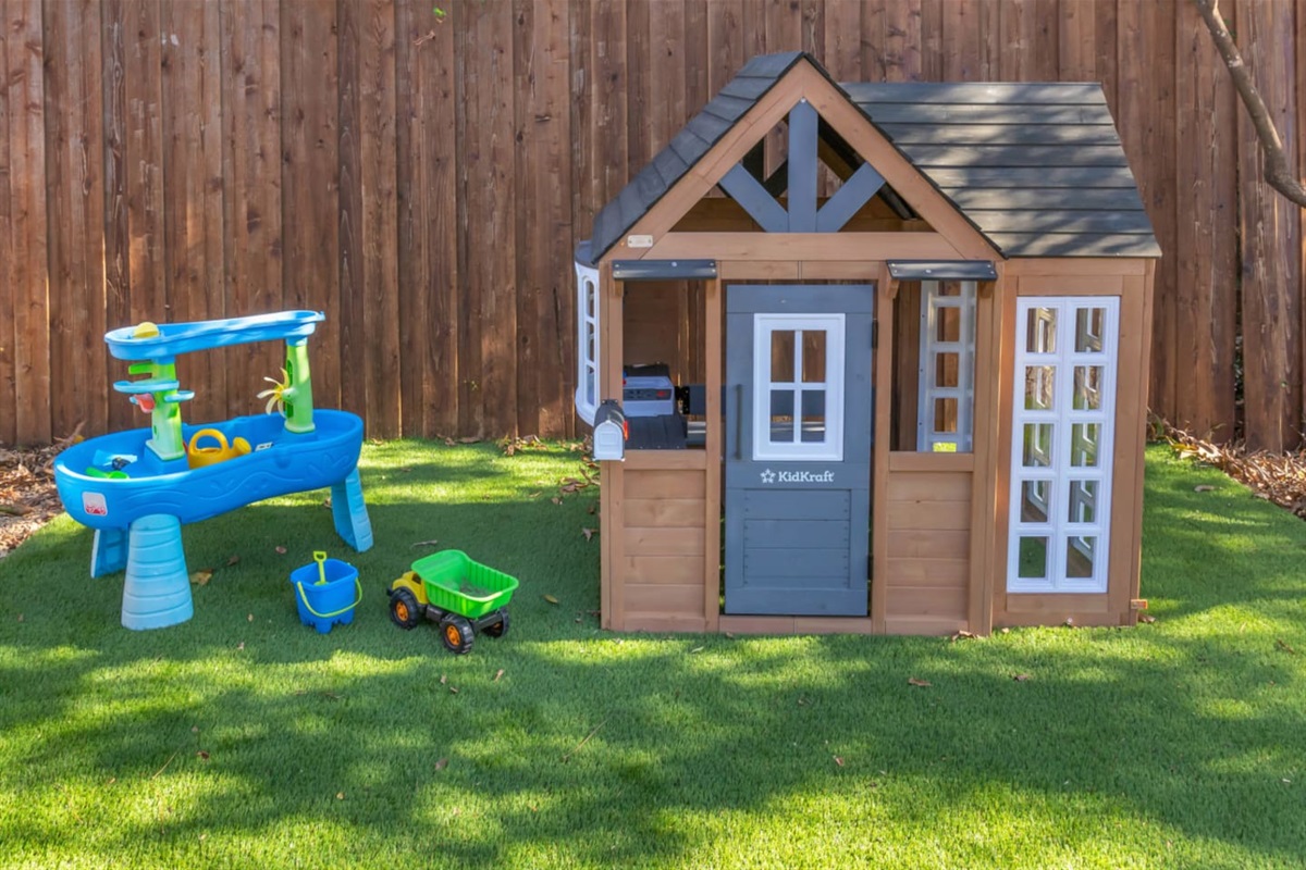 Backyard view showcasing the children’s play retreat—ample space to run, play, and enjoy outdoor activities in a private, family-friendly setting.