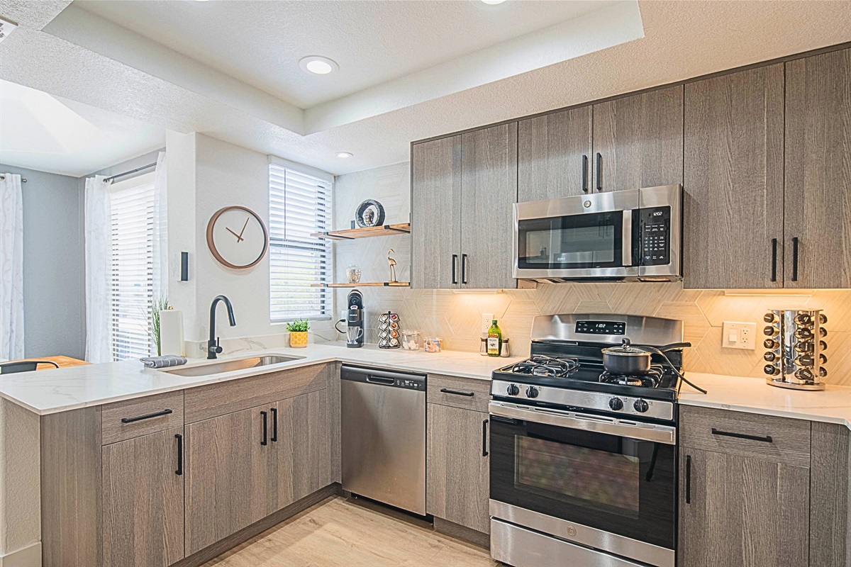 "Cook up a storm in our fully equipped kitchen, complete with modern appliances and a cozy dining nook.