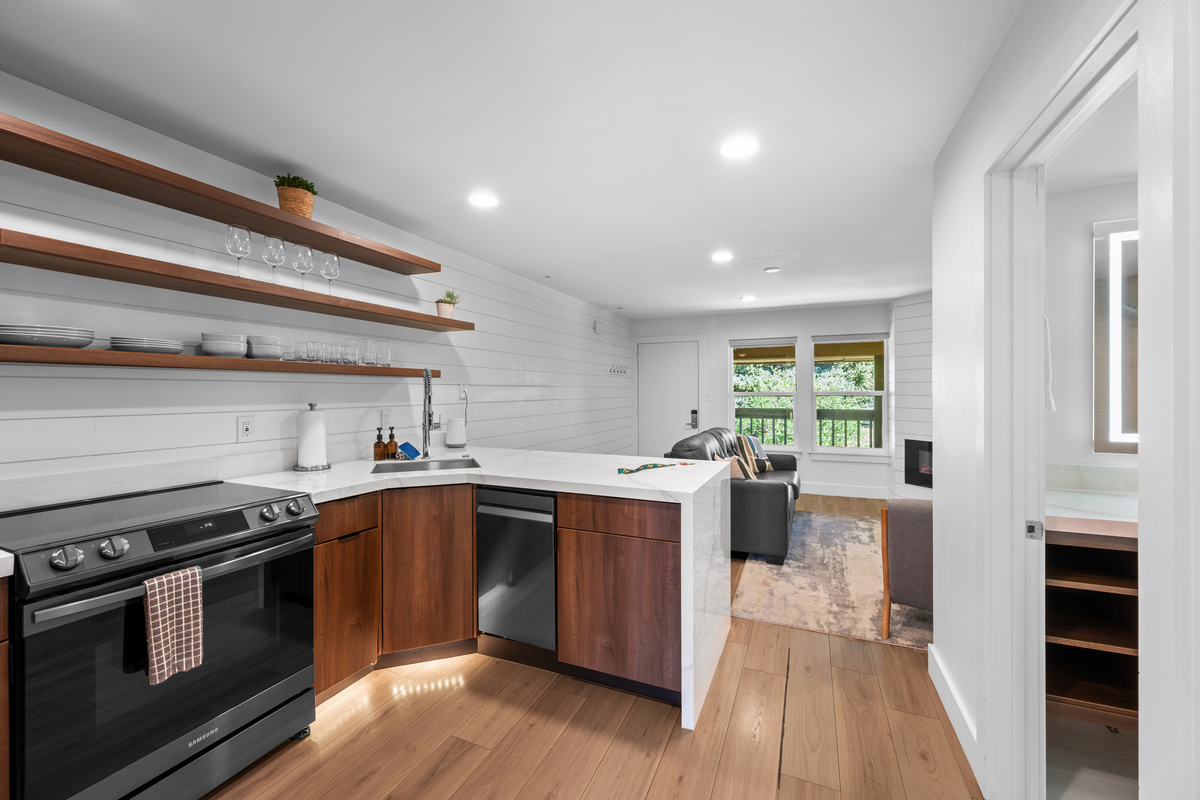 Well-appointed kitchen featuring modern appliances and everything needed for meal preparation.