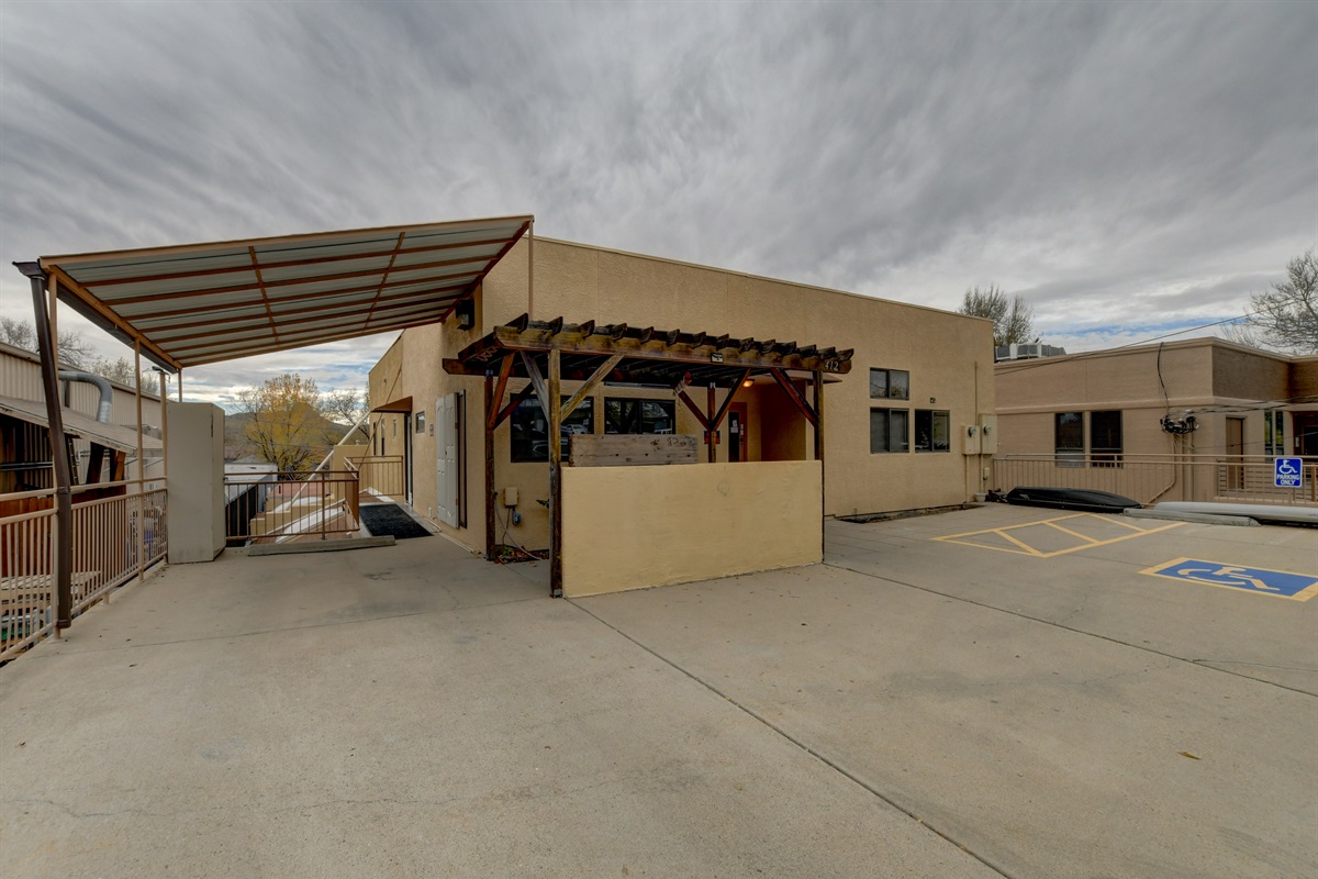 Quietly located in a sleepy mixed use area, set back from the street.