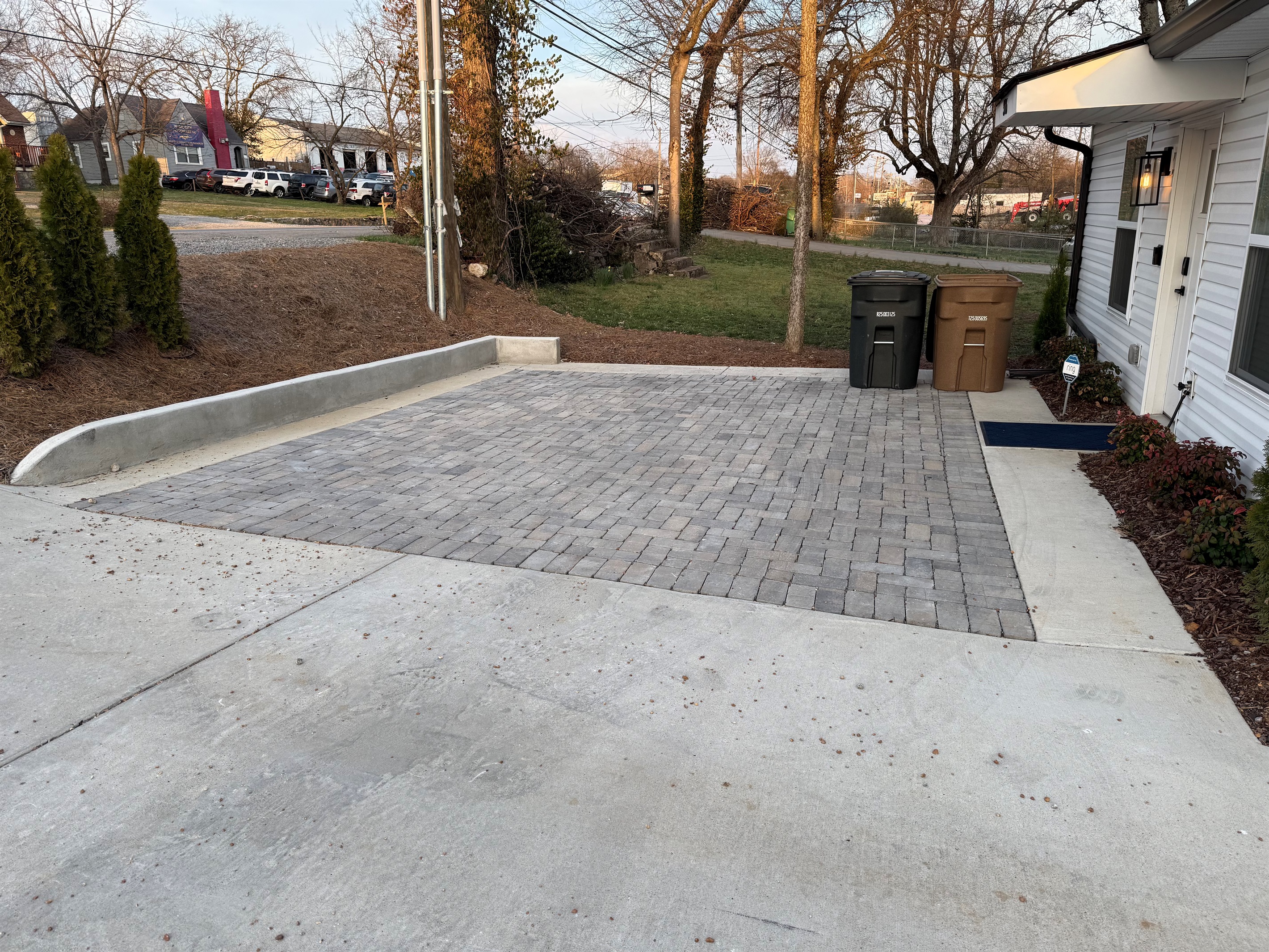 2 complimentary standard-sized vehicle parking spaces- front of the house 