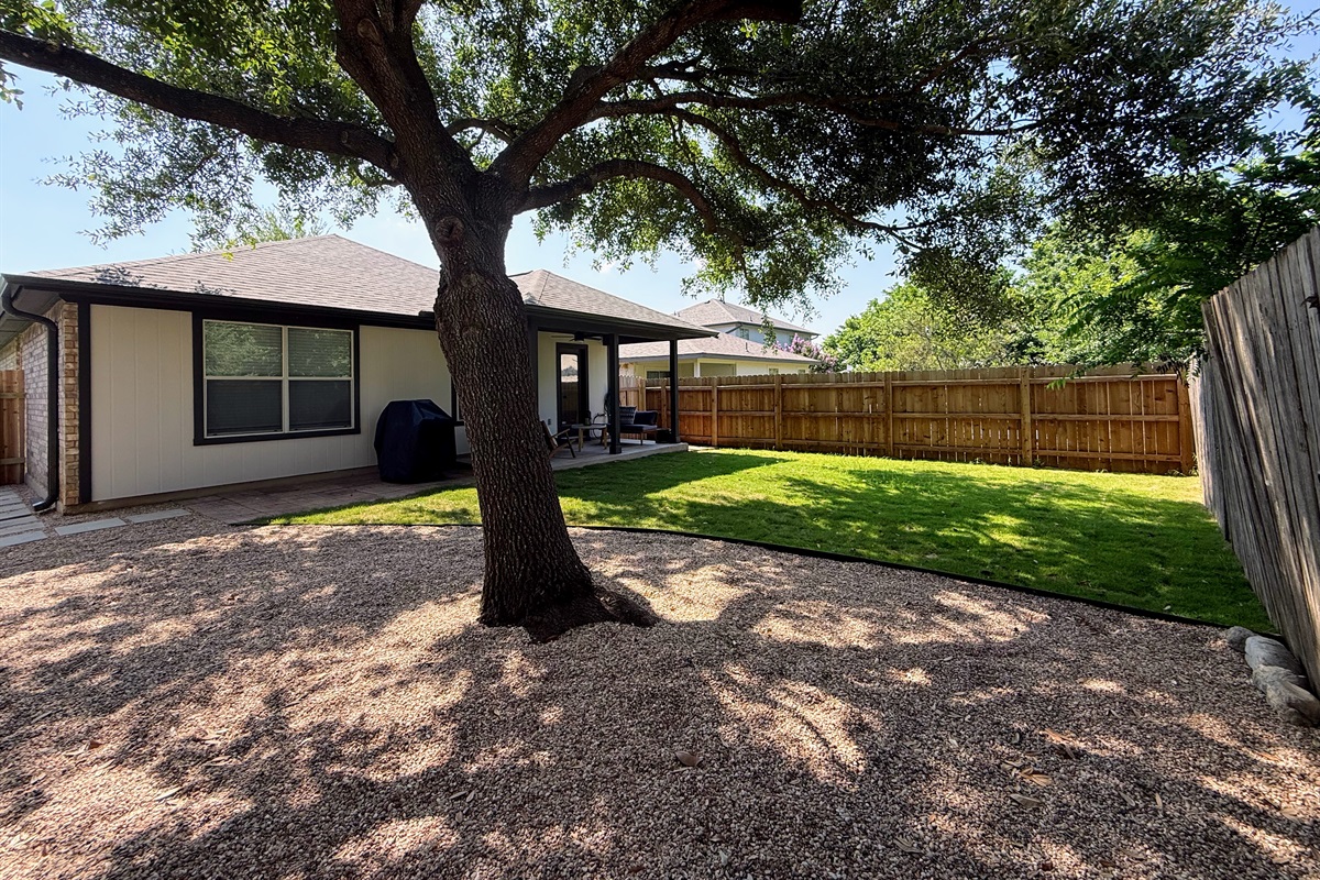 Side view of fenced backyard
