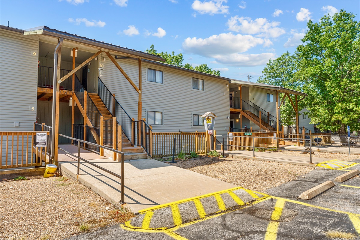 Your building sits high on the hillside, close to parking and surrounded by mature trees.