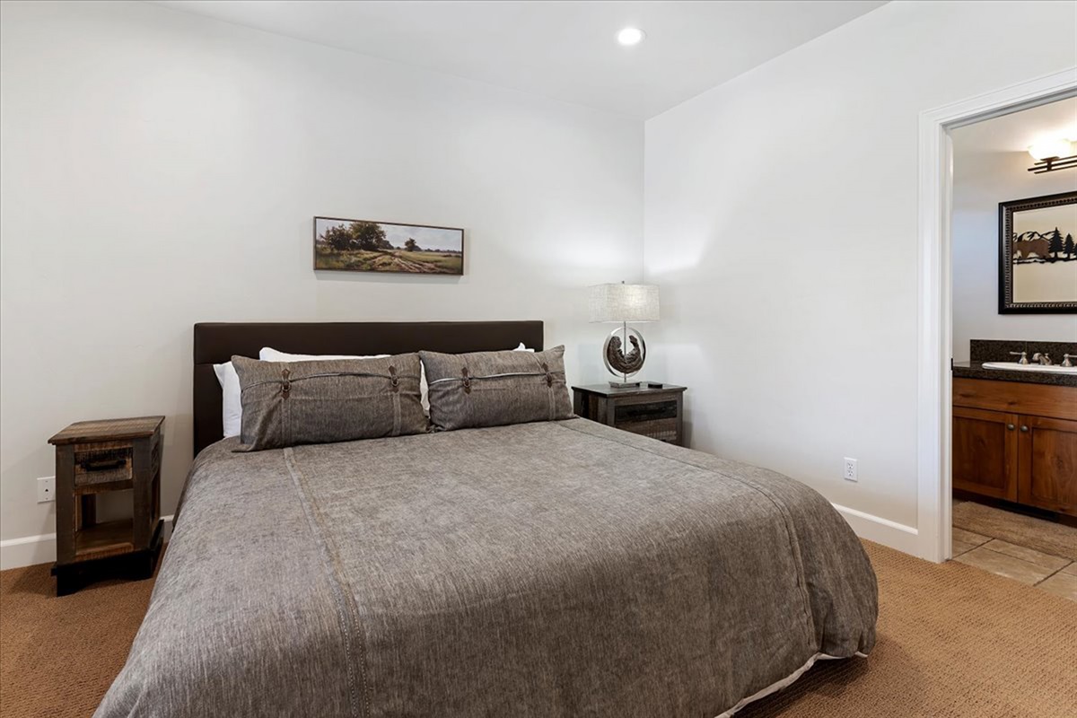 A private king bedroom retreat with soft lighting and direct access to an ensuite bathroom—ideal for added comfort and privacy.