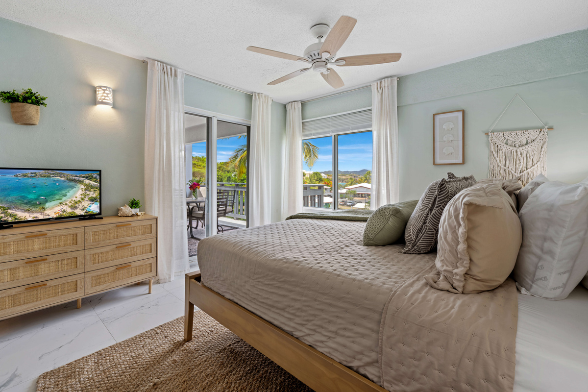 A bright and inviting primary suite with plenty of space to unwind.
