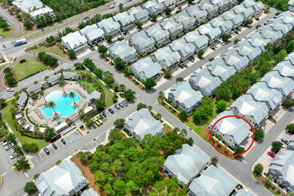 Capture the convenience of our location with this photo, showcasing how close the home is to the resort-style pool area.