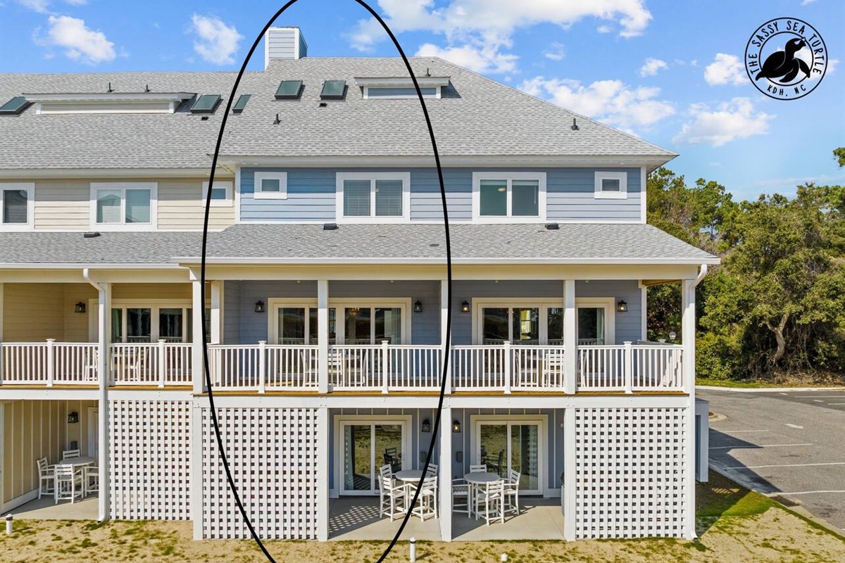 Private ground level patio with hot tub, table and chairs, and.grill.Private 2nd level patio with table and chairs.