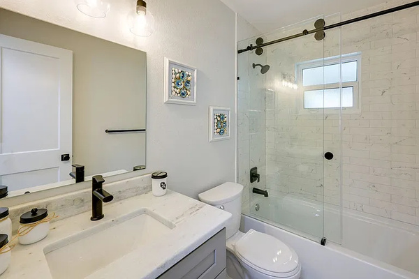 Bathroom with tub and shower