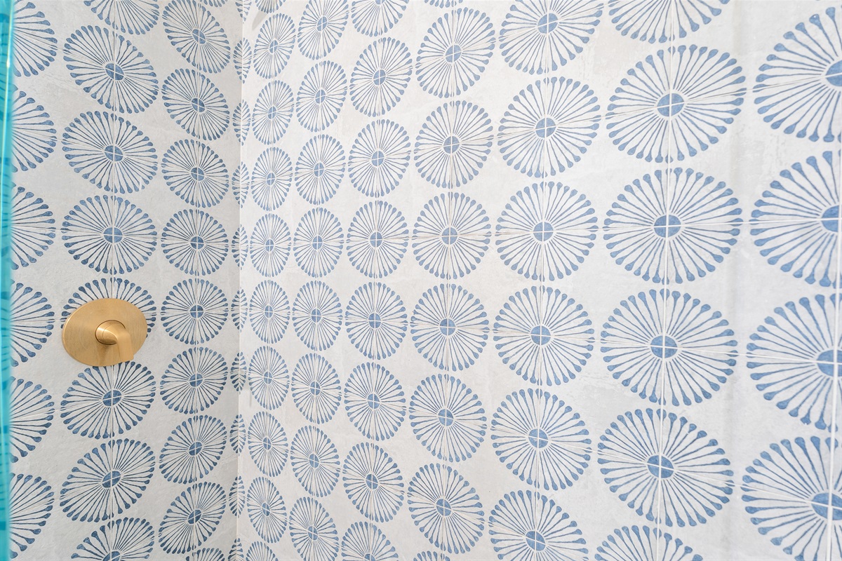 Designer "Petal" tilework adds a touch of artistic luxury to your morning routine.