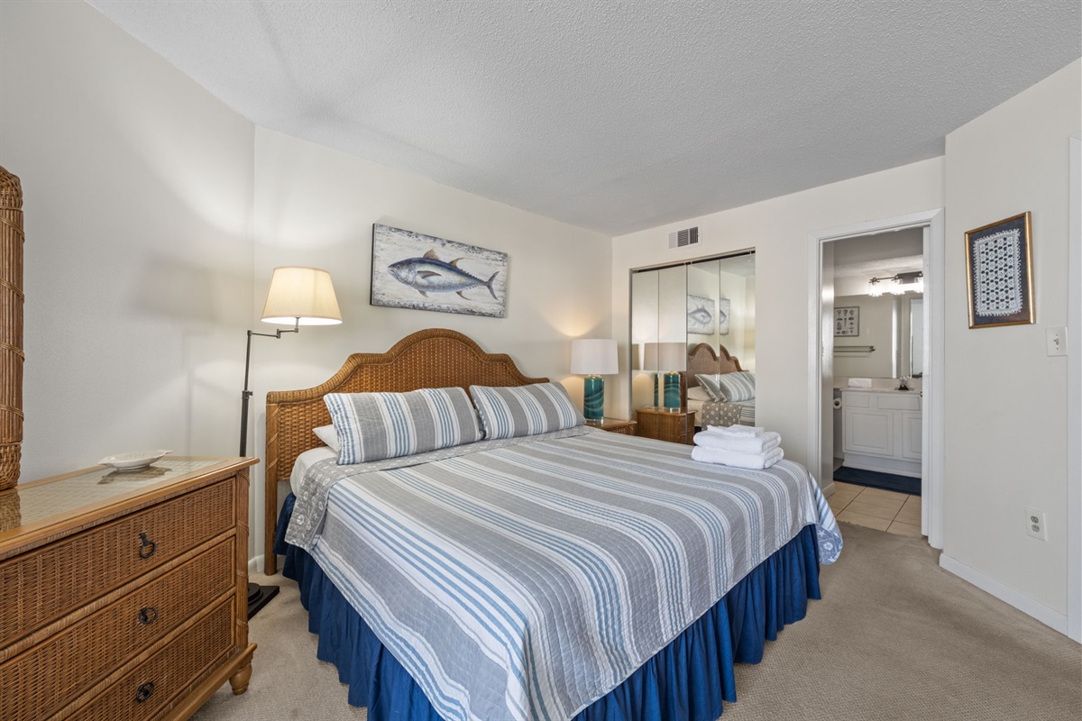 Comfortable king bed with fresh linens and a peaceful setting for restful nights