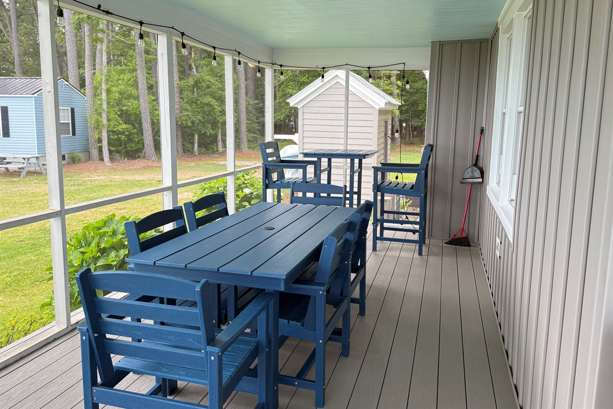 Wrap around screen porch with dining for 8.