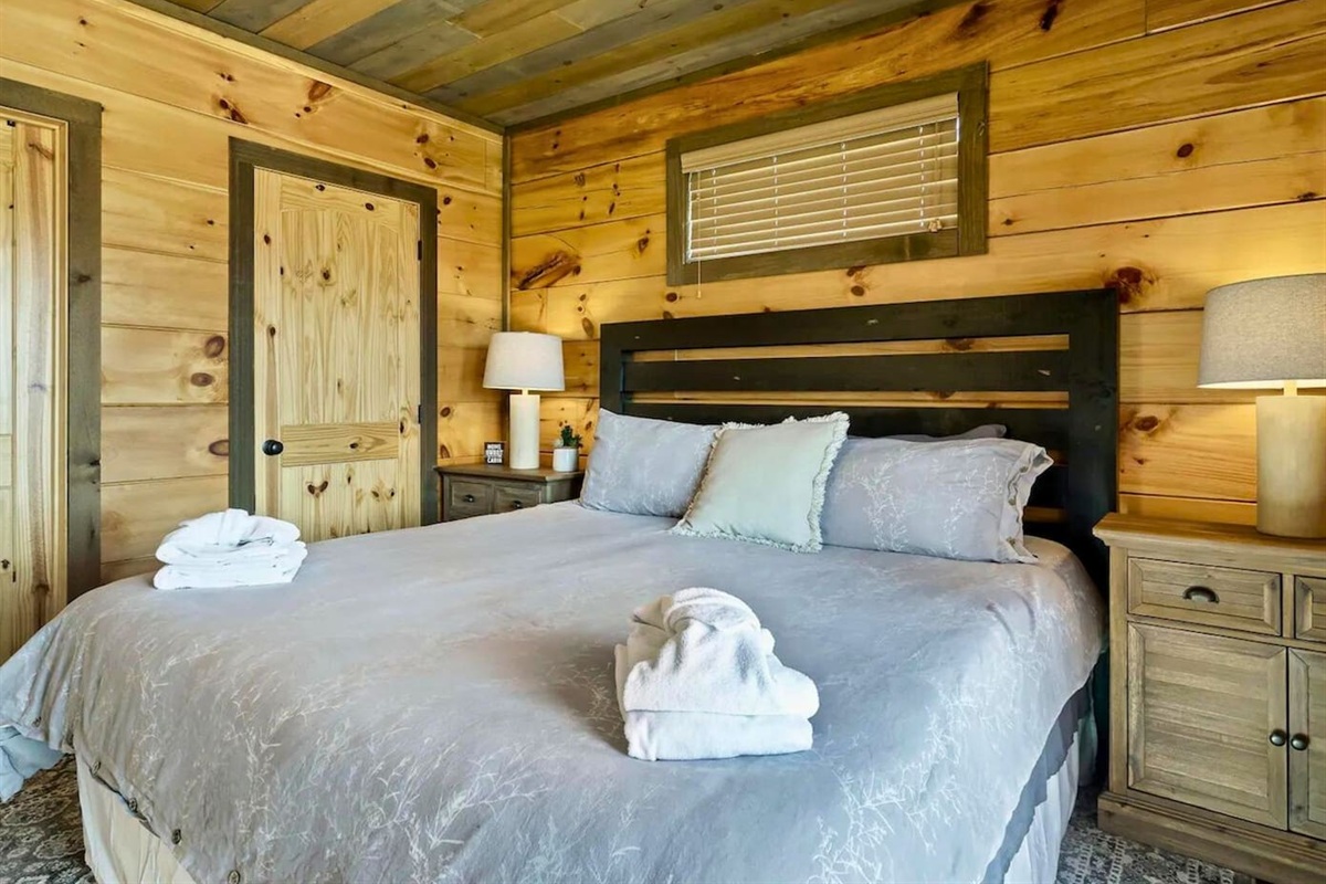 Queen Suite with Private Bathroom and Inviting Bedding