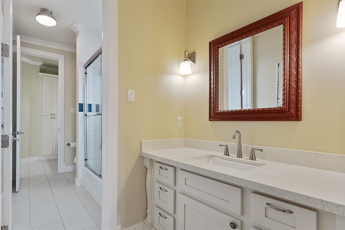 Full Bathroom #2: Modern Jack and Jill bathroom with full amenities.