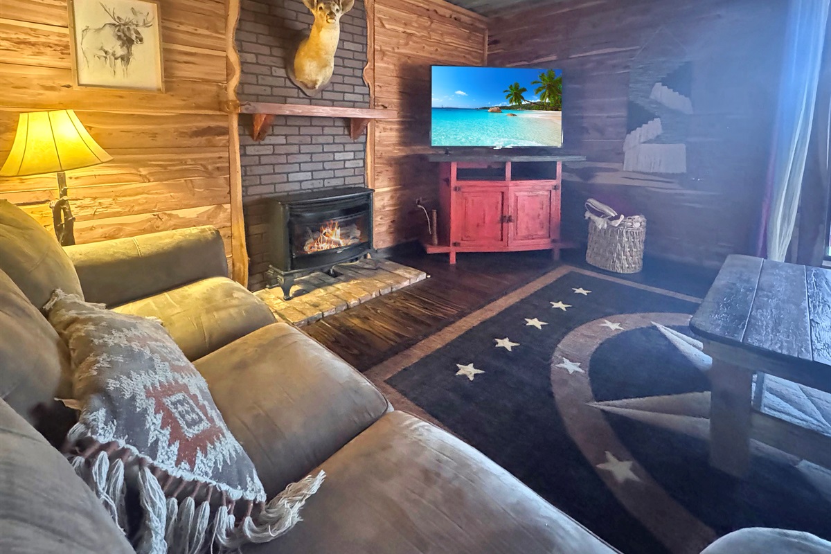 Fire glowing, family gathered - this is what cabin life is all about.