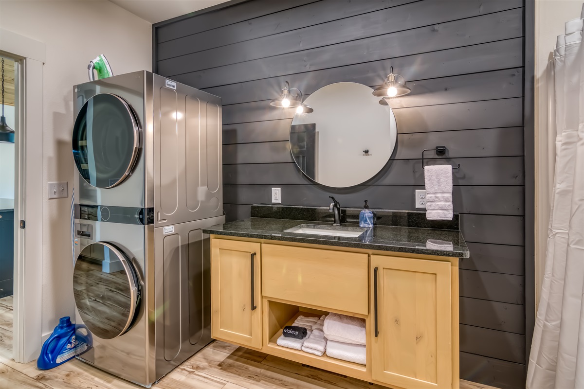 Stacked washer/dryer in main bathroom