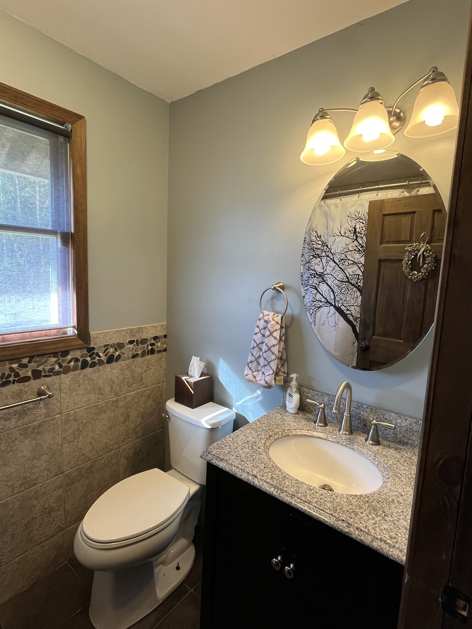 bath with tub/shower off hallway