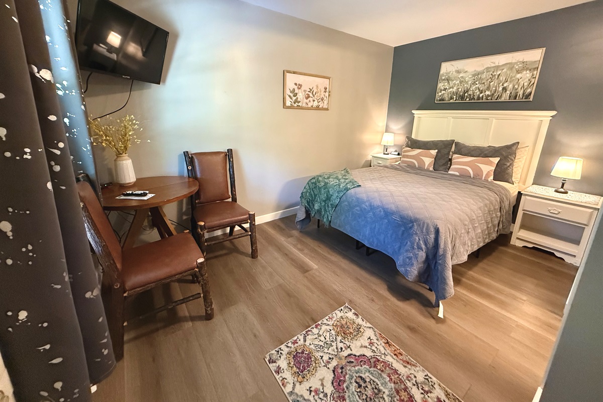 Small table and chairs in the queen room.