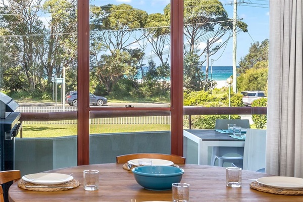 Watch the ocean through the trees.