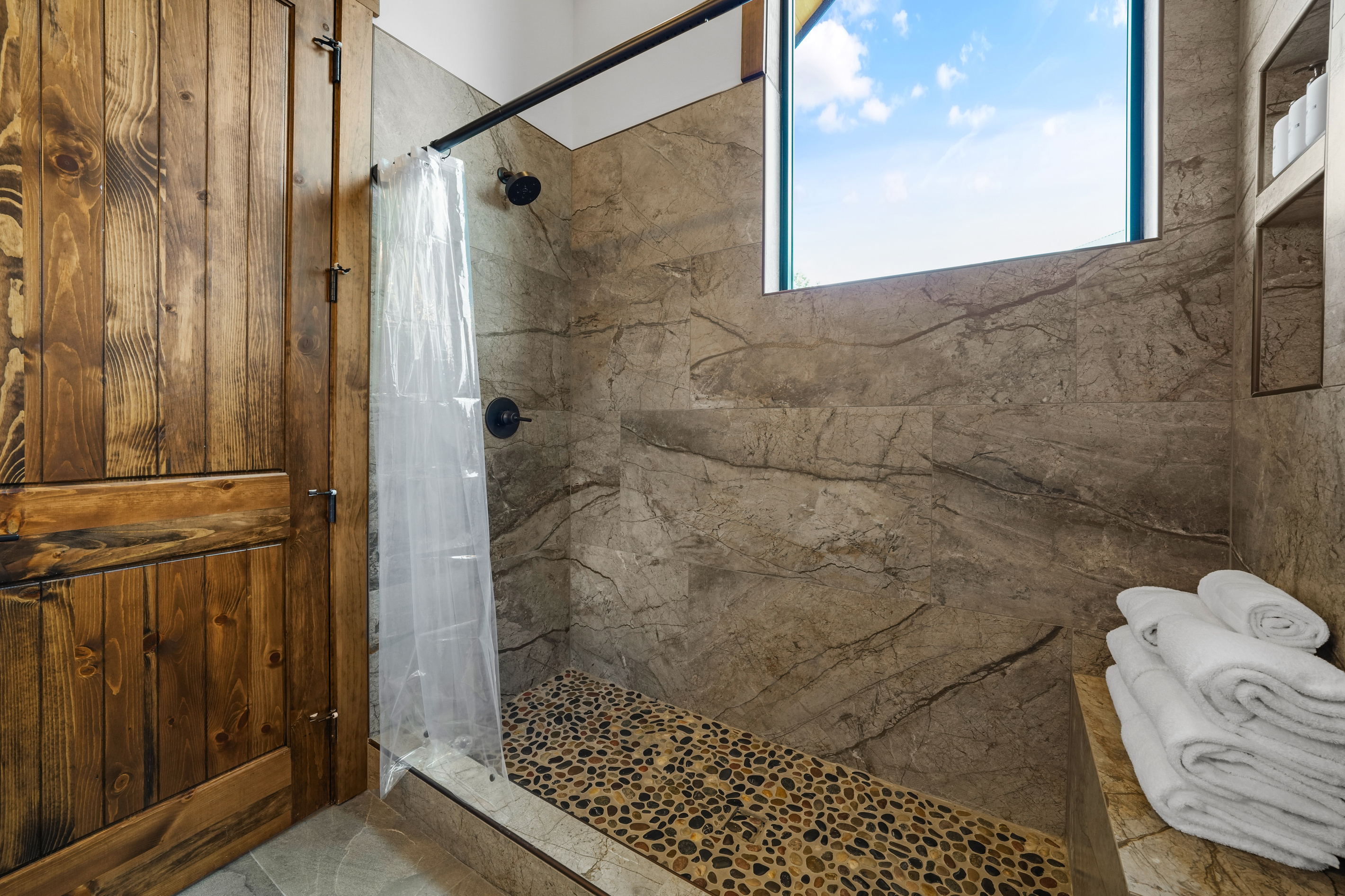 This is the bathroom en-suite to the two queen over queen bunks. Soak up the sun with this extra large window.