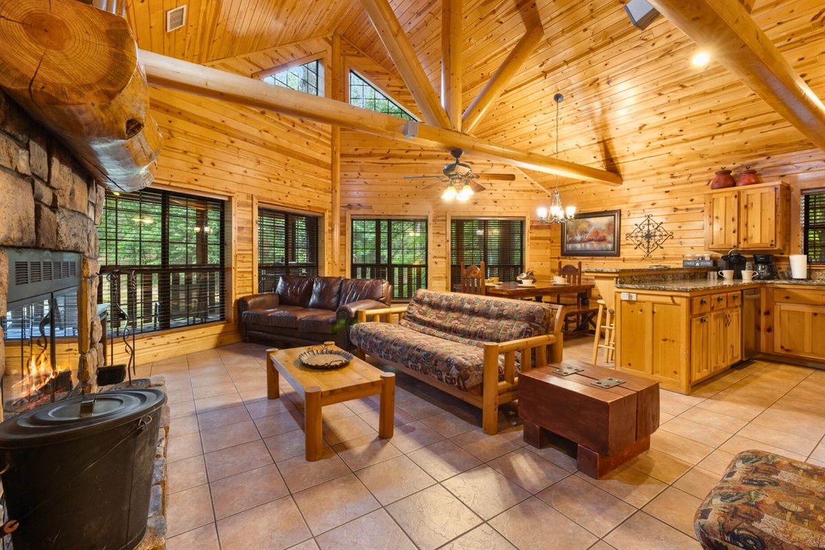 Open-concept living area with vaulted ceilings and natural light.