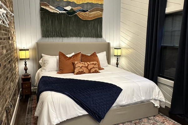 The Boho Room. Original exposed brick and hardwood floors.