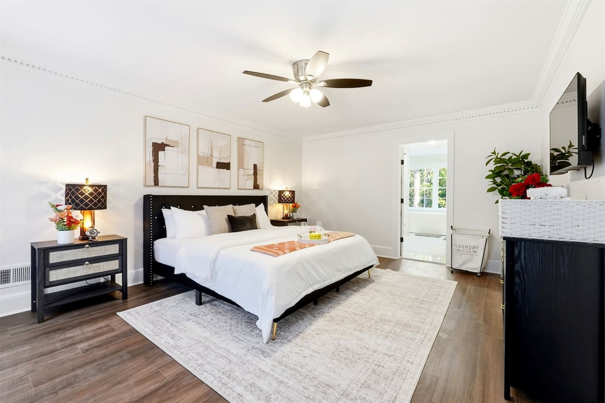 Spacious main-level master bedroom featuring a king bed, a Roku-powered Smart TV, and conveniently located to the left as you enter the home. This room includes 2 full-body towels, 2 washcloths, and 2 hand towels for your stay.