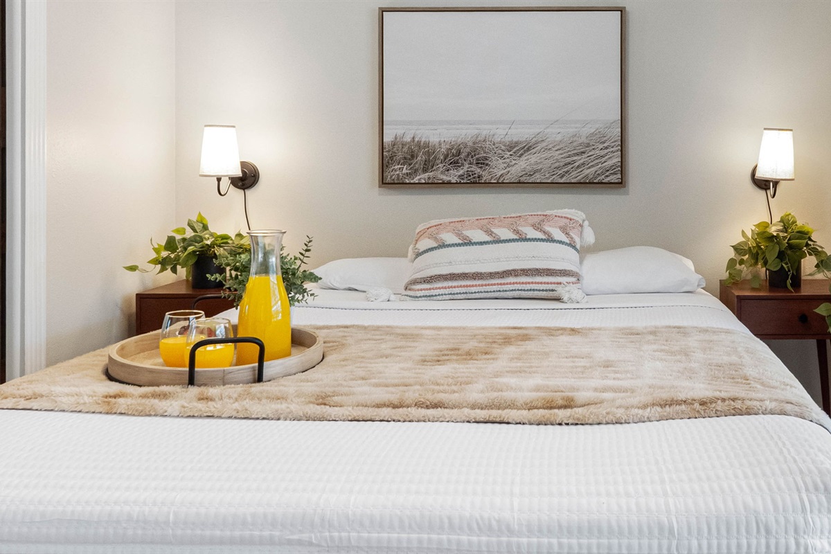 Neutral tones and modern finishes create a relaxing atmosphere in this inviting room.