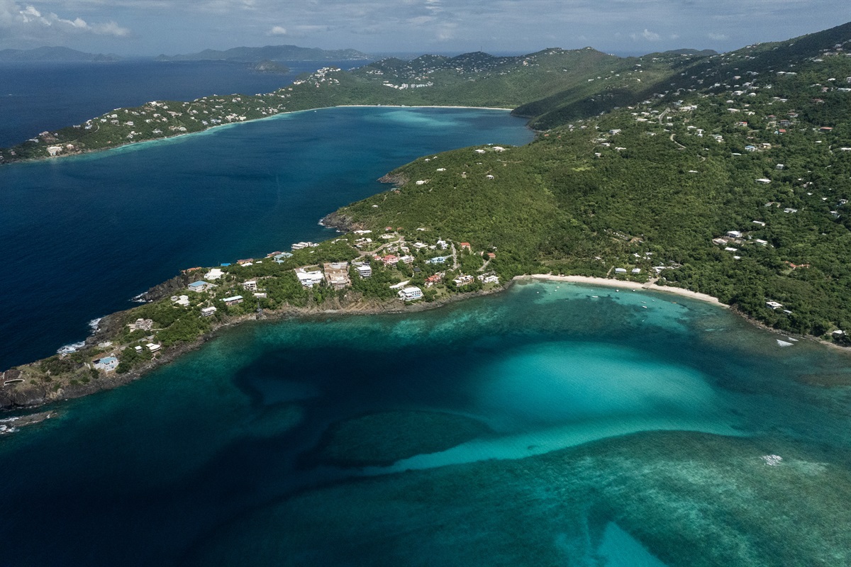 Breathtaking aerial view of the property and surrounding coastline.