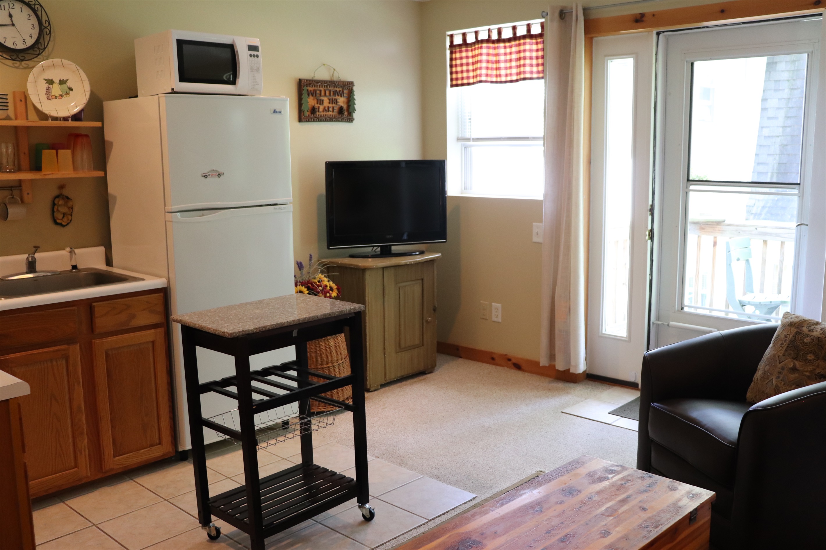 Living Room/Kitchen area with TV.