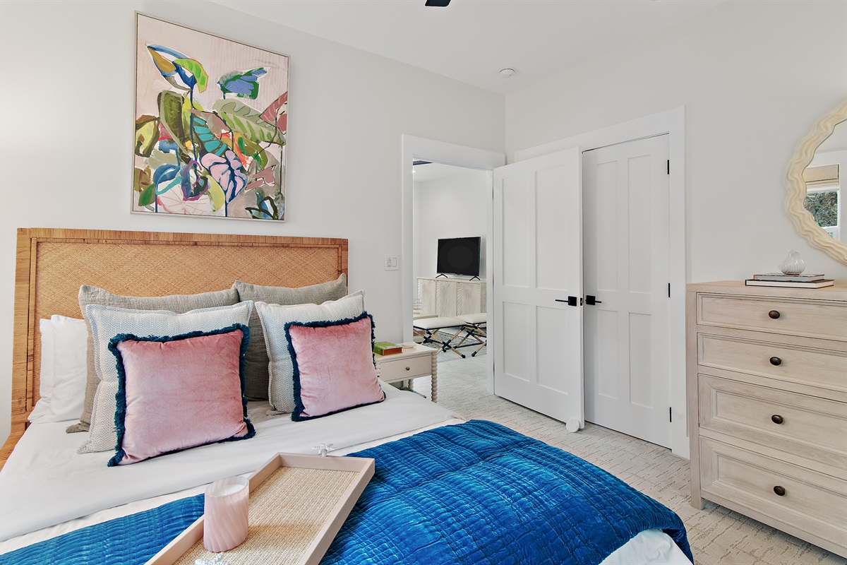 The queen bedroom come off of the second floor living area.